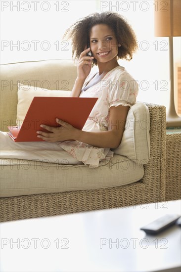 African woman working at home