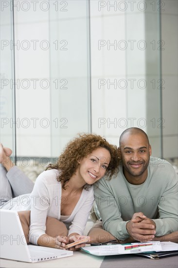 African couple working at home