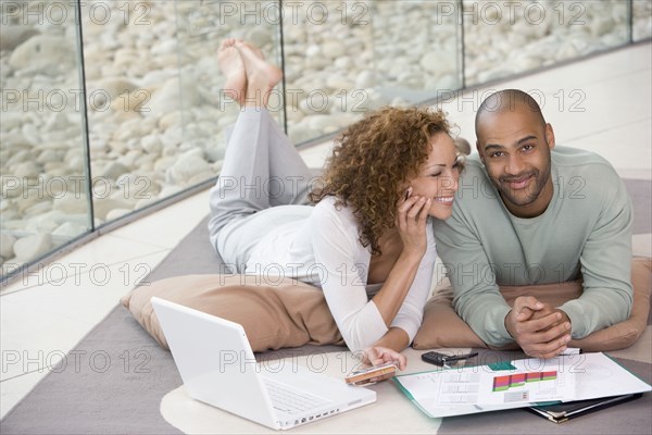 African couple working at home