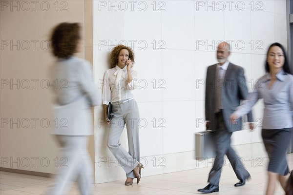 African businesswoman talking on cell phone