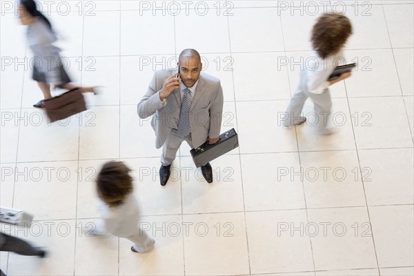 African businessman talking on cell phone