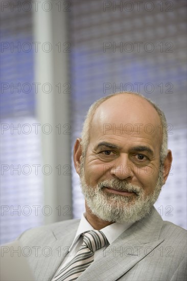 Portrait of senior African businessman