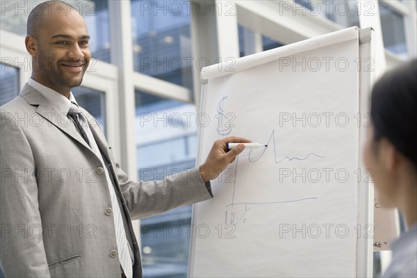 African businessman giving presentation