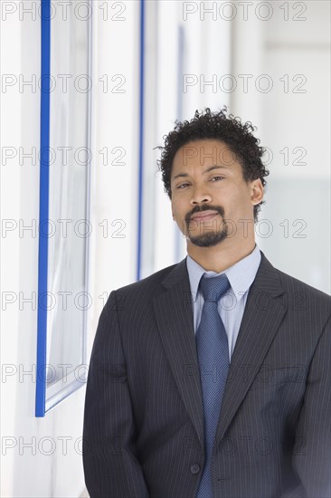 Serious African businessman with goatee