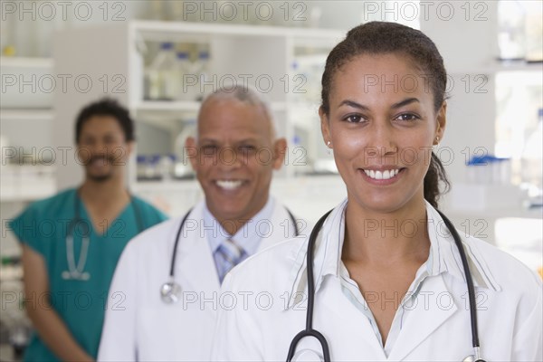 Smiling doctors in hospital laboratory