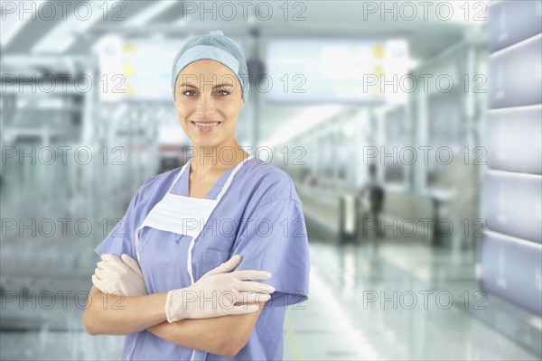 Mixed race doctor wearing scrubs in hospital