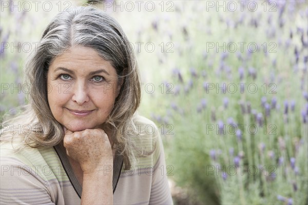 Senior Caucasian woman relaxing outdoors