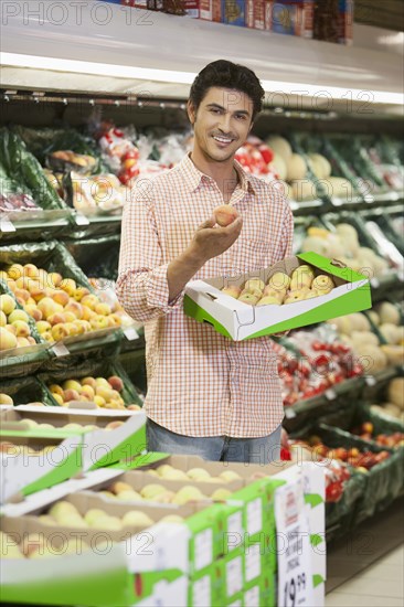 Caucasian man shopping in grocery store