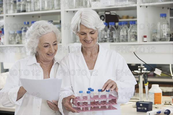 Senior Caucasian scientists working in lab