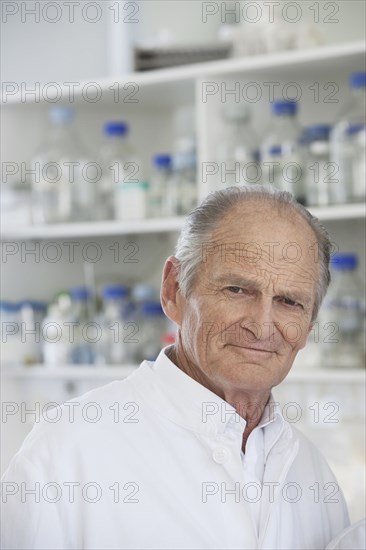 Senior Caucasian scientist working in lab