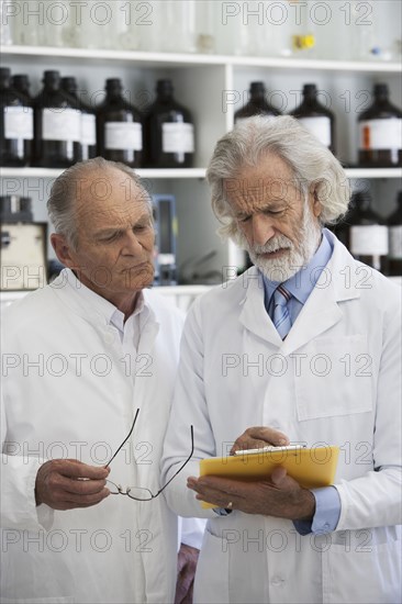 Senior Caucasian scientists working in lab