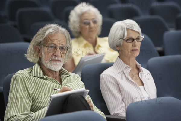 Senior Caucasian students sitting in classroom