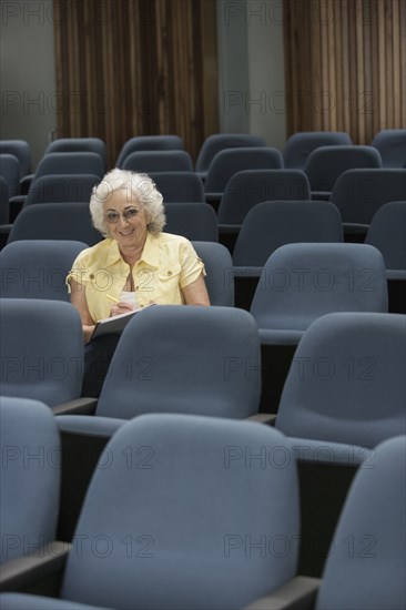Senior Caucasian student sitting in classroom