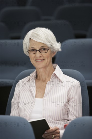 Senior Caucasian student sitting in classroom