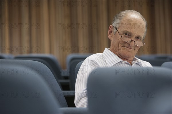 Senior Caucasian student sitting in classroom