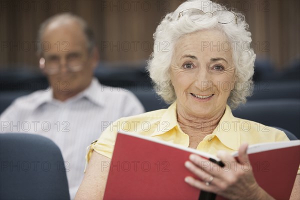 Senior Caucasian students sitting in classroom