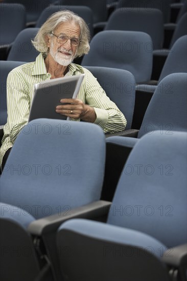 Senior Caucasian student sitting in classroom