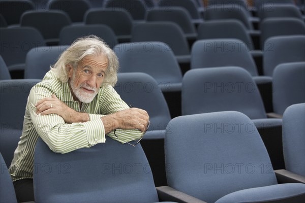 Senior Caucasian student sitting in classroom