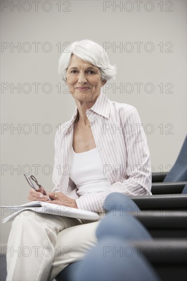Senior Caucasian student sitting in classroom