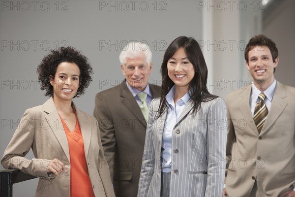 Business people smiling in office