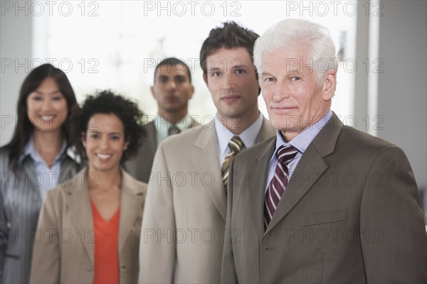 Business people smiling in office