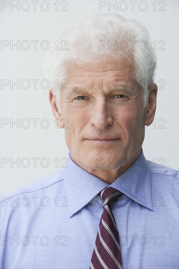 Close up of Caucasian businessman's serious face