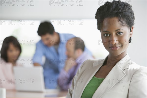 Businesswoman smiling in office