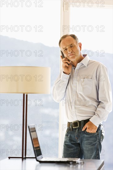 Businessman talking on cell phone