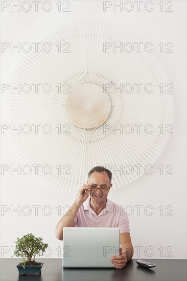 Businessman working at desk in office