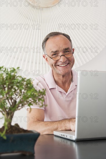 Businessman working at desk in office