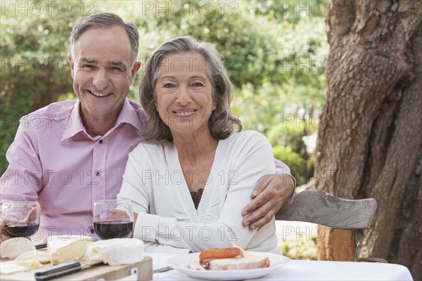 Couple eating together outdoors