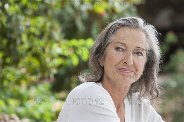 Woman sitting outdoors