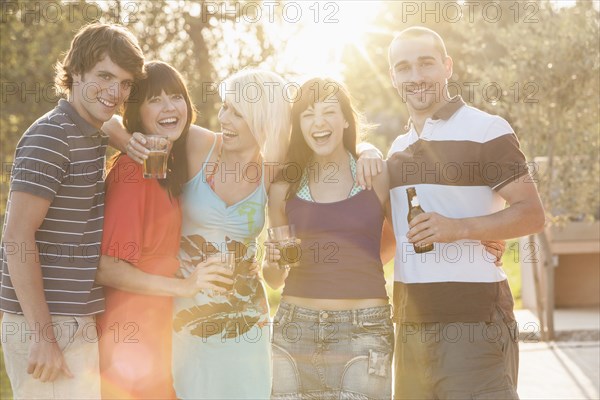 Friends drinking together at party