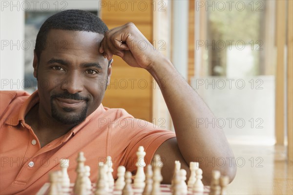 African American man playing chess