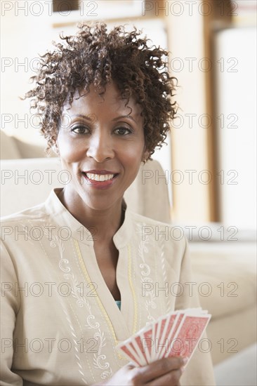 African American woman playing cards