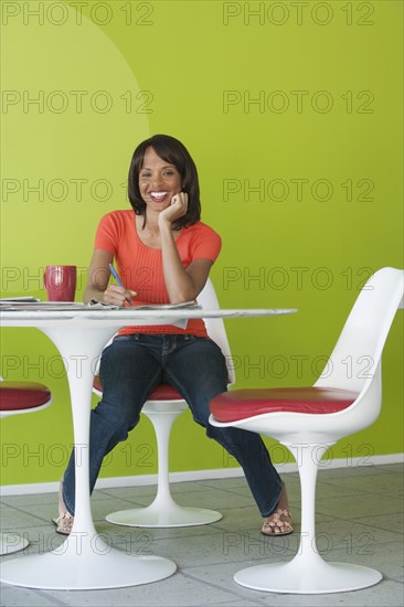 Woman studying in cafe