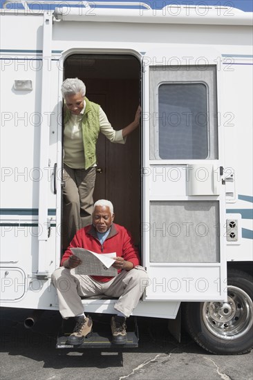 Mixed race Senior couple relaxing in RV