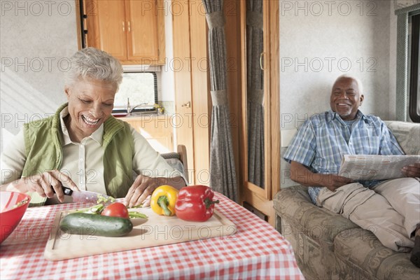 Mixed race Senior couple relaxing in RV