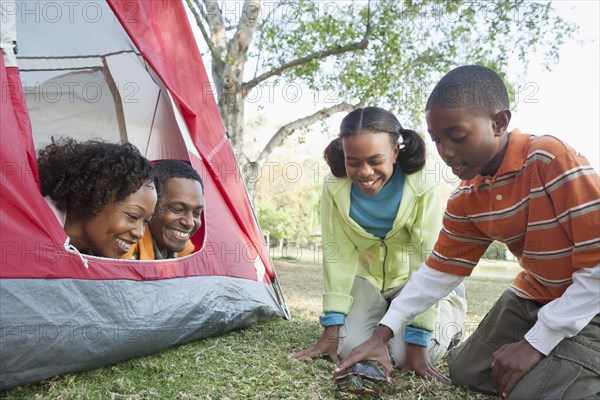 Family playing together at campsite