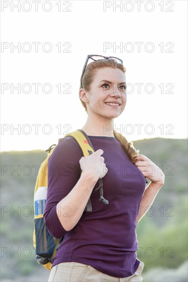 Caucasian hiker wearing backpack