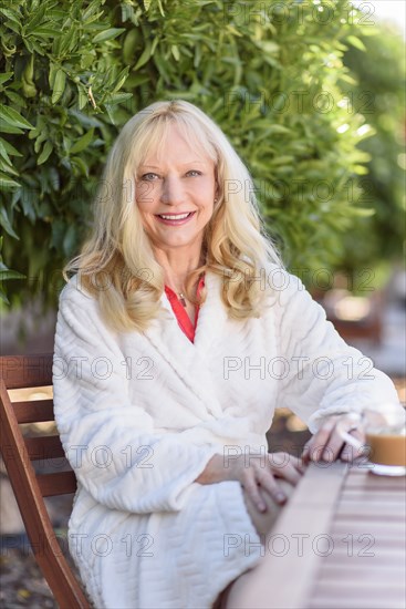 Caucasian woman drinking coffee