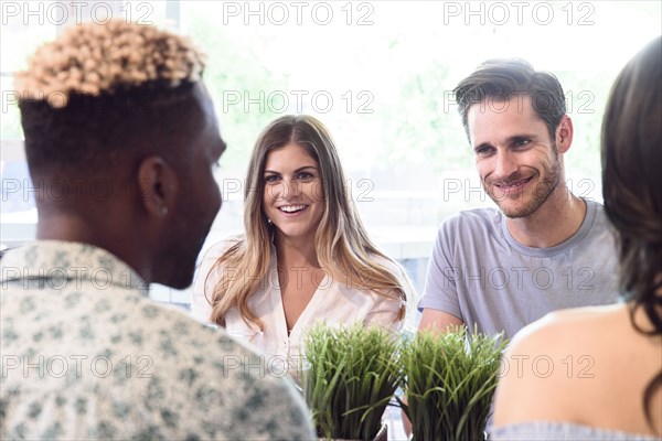 Friends smiling and talking