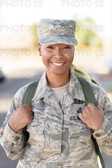 Portrait a smiling black woman soldier