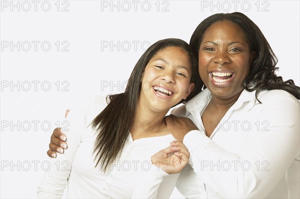 African mother and daughter laughing