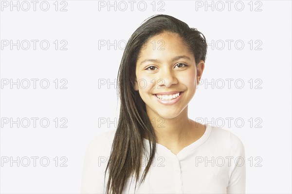 Studio shot of African girl smiling