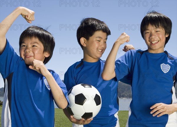 Asian boys with soccer ball