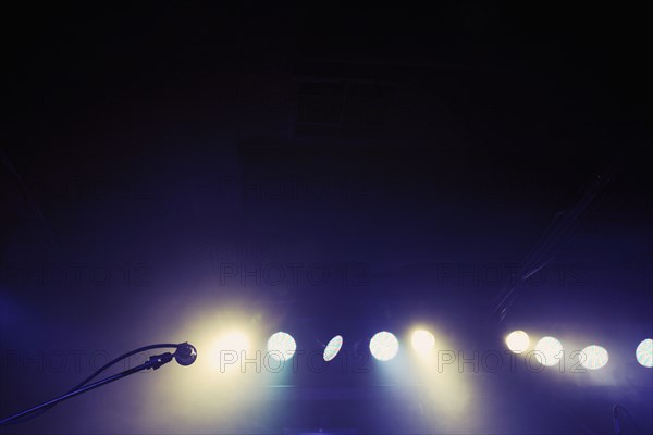 Microphone and spotlights on stage