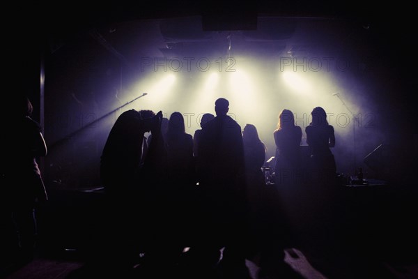 People socializing in nightclub