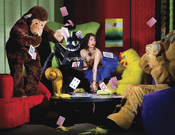 People in animal costumes playing poker