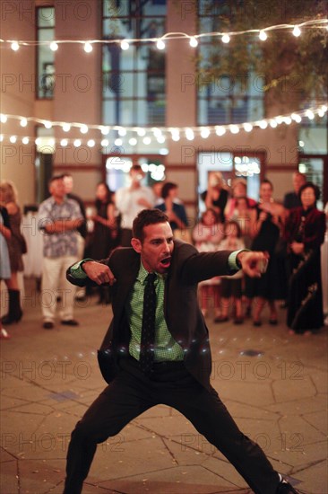 Man dancing at wedding reception